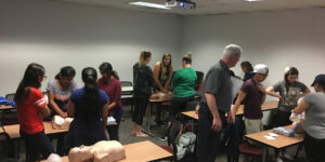ACLS class in session with multiple people