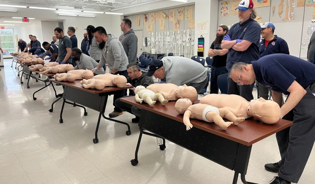 a group of people training in ACLS