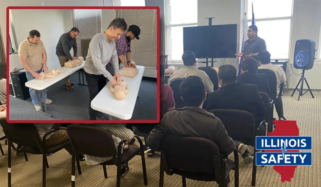 A group of people training in a CPR course.