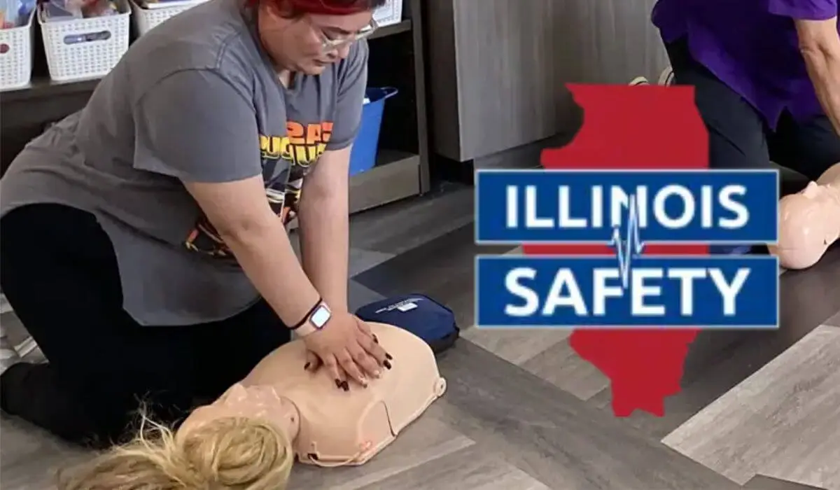 Participant practicing CPR techniques during life support courses at Illinois Safety, highlighting the importance of life support training for employees and workplace safety training.