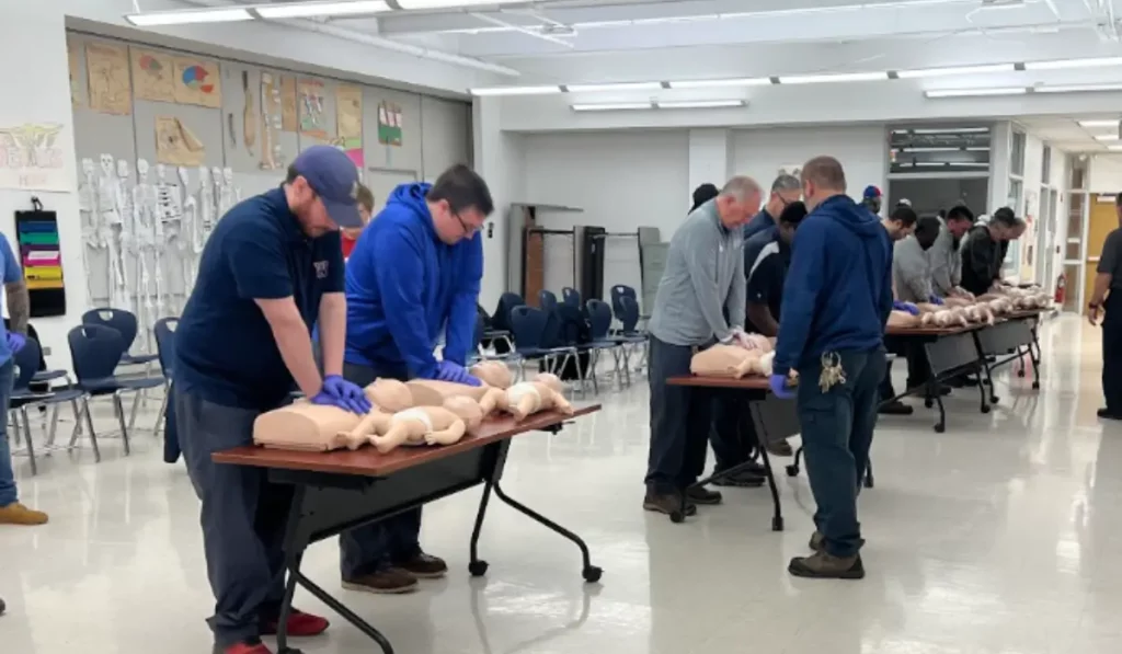 Online BLS Courses students practicing CPR skills during healthcare certification training class session